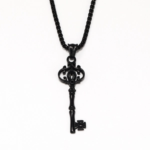 Retro black gothic crown key pendant necklace for men with intricate carved patterns