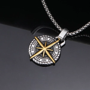 Nordic vintage compass pendant in gold and silver steel with a sleek box chain