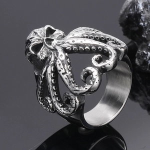 Macro shot of punk octopus skull ring with detailed tentacles in antique silver finish