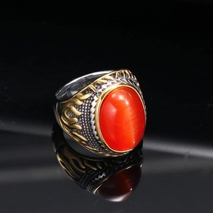 Retro punk titanium steel ring with gold flame relief and oval red opal stone inlay