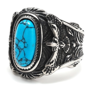 Anillo de águila vintage en acero de titanio con turquesa azul y grabados tribales