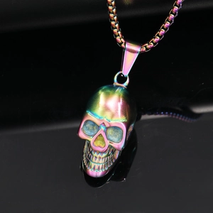 Rainbow plated stainless steel skull pendant on box chain with reflective surface