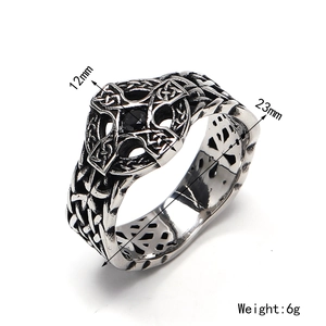 Retro stainless steel cross ring with black gemstone inlay and vintage woven texture