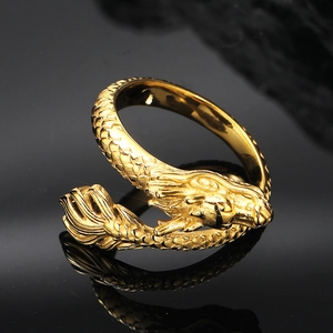 Macro view of golden dragon ring detail with detailed scales and reflective metal