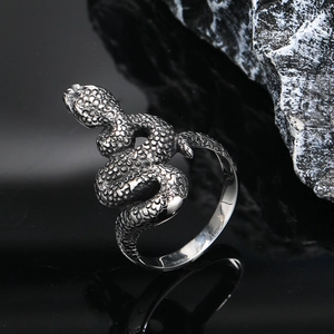 Macro view of a snake ring with detailed scale texture and retro punk titanium steel finish