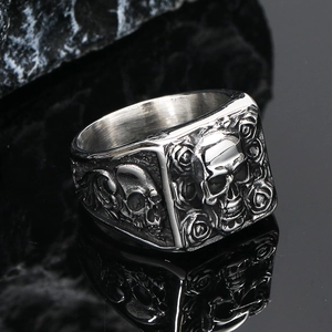 Gothic retro rose skull titanium steel ring for men with vintage finish on dark rock base