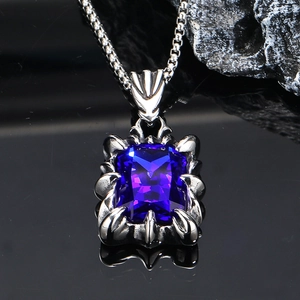 Retro dragon claw pendant necklace with square blue gemstone on a metallic box chain