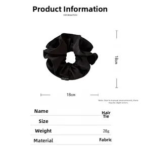 Dettaglio di un elastico per capelli in tessuto nero da 18 cm con dimensioni e finitura