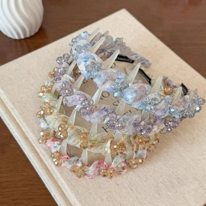 Elegant floral fabric headband with sparkling crystal beads and non-slip inner teeth