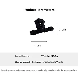 Detail view of 11cm black fabric hair claw clip with elegant pleated texture and dimensions