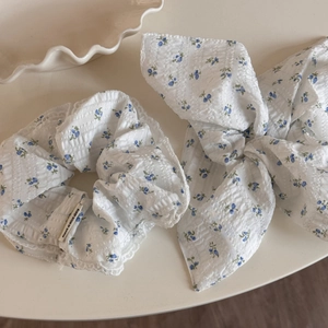 Blue floral scrunchie set with white lace trim and long ribbon for women ponytail style