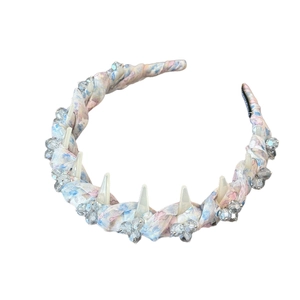Elegant floral fabric headband with sparkling crystal beads and white spiked accents