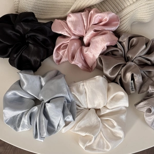 Elegant satin scrunchie set in assorted colors with a glossy silk-like finish for women