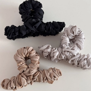 Three-piece large hair claw set in black, silver, and champagne pleated satin fabric