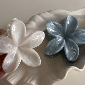 Floral acetate hair claw clips with marble texture in cream and morandi blue colors