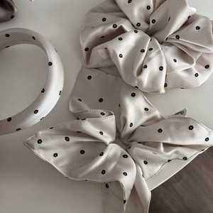 Detailed set of floral champagne satin scrunchie, bow hair tie, and padded headband