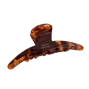 Elegant large tortoiseshell acetate claw clip with gold France Handmade logo on white background