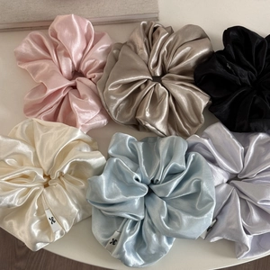 Set of 6 oversized satin hair scrunchies in cream pastel colors with silk texture