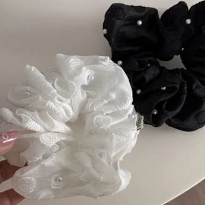 Set of two elegant scrunchies in black and white with textured dots and pearls