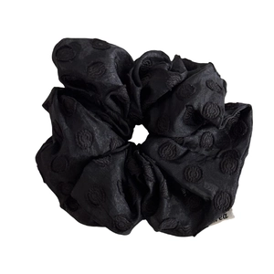 Elegant black pearl embroidery hair scrunchie with jacquard dot pattern and logo label