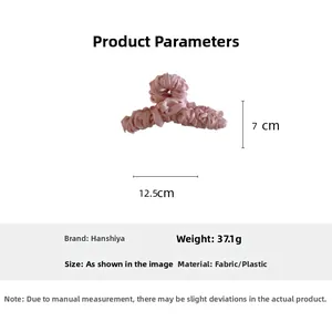 Pink pleated fabric hair claw clip dimensions showing 12.5cm length and 7cm height