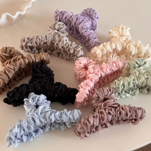 Elegant mercerized pleated fabric hair claw clips in various Morandi colors for women