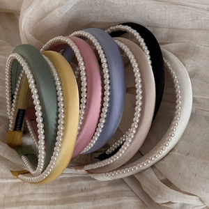 Elegant multi-color satin pearl padded headbands in seven pastel shades for women