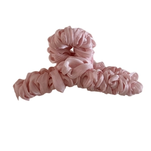 Elegant large silk satin pleated claw clip in soft pink for women's thick hair styles