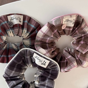 Three premium plaid hair scrunchies with decorative buttons and handmade labels
