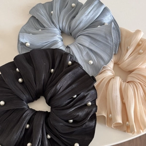 Three pleated chiffon scrunchies with pearls in misty blue, black and apricot colors