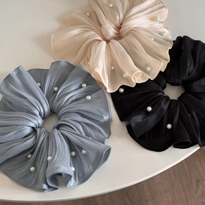 Three-piece pleated pearlescent chiffon scrunchie set with bead accents in neutral colors