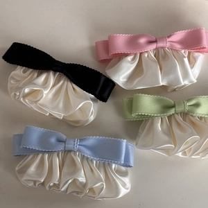 Elegant French vintage bow hair clips with ruffled edges in multiple soft colors