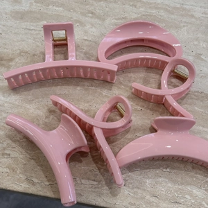 Set of 5 minimalist pink hair claws in various geometric shapes for women's hairstyling