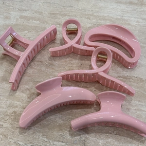 Set of 6 minimalist light pink hair claws in various geometric shapes with metal springs