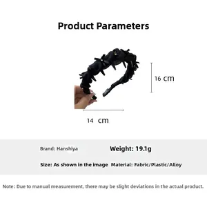 Detailed view of rhinestone bow headband showing 16cm height and 14cm width dimensions