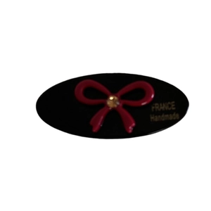 Elegant handmade French style bow hairpin in black and red with golden accents