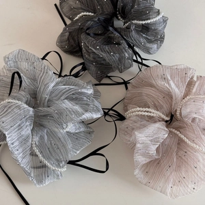 Elegant scrunchies with faux pearls and black ribbons in grey and pink shades