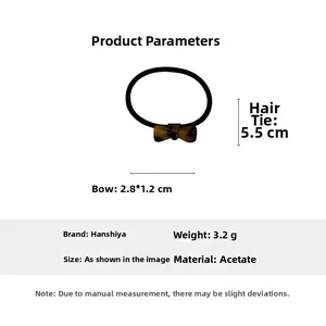 Detailed parameters of acetate bow hair tie showing 5.5cm diameter and dark brown marble texture