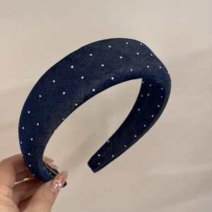 Detailed view of the thick denim headband with sparkling silver rhinestones and anti-slip teeth