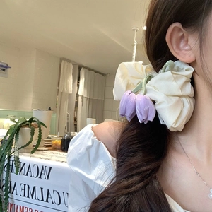 Elegant off-white tulip scrunchie with purple floral pendant for sweet ponytail hairstyles