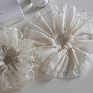Elegant white lace and chiffon hair scrunchies with polka dot patterns for women