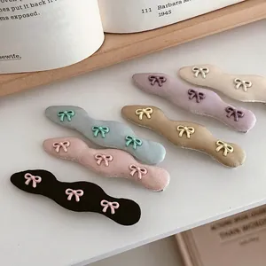 Damen Bonbonfarben Wellig Satin Stoff Schleife Haarclips Koreanischer Stil Süße Legierung Entenschnabel Seitenclips Haarschmuck