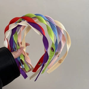 Elegant multi-color ribbed fabric headbands with small gold metal charm pendants