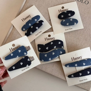 Denim hair clips set with white heart patterns including BB clips and duckbill clips