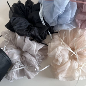 Chic multi-color organza scrunchies with ribbon bows for elegant hair styling