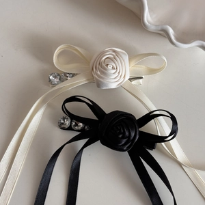 Elegant rose ribbon bow hair clips with rhinestones in black and cream white