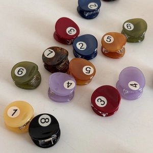Mini billiard ball acetate hair claws in various colors with numbered 1-8 pool designs