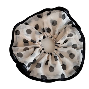 Elegant white chiffon polka dot scrunchie with black edge and CHANGE typography design