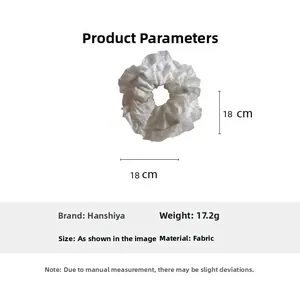 Detail view of 18x18cm white oversized lace scrunchie showing fabric layers and 17.2g weight