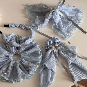 Blue fabric hair accessory set with oversized scrunchie, headband, and pearl bow clip